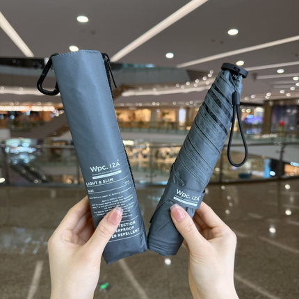 日本Wpc超轻便携纯色太阳伞中性黑胶三折IZA晴雨防晒紫外线遮阳伞