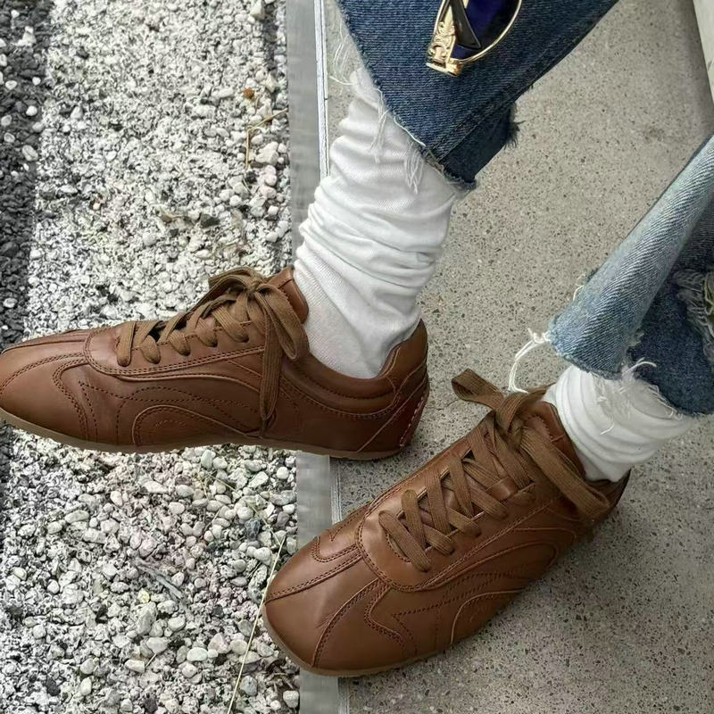 诗歌兰2025年新款真皮厚底德训鞋