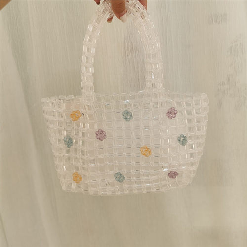 旅行镂空编织串珠手提包新品