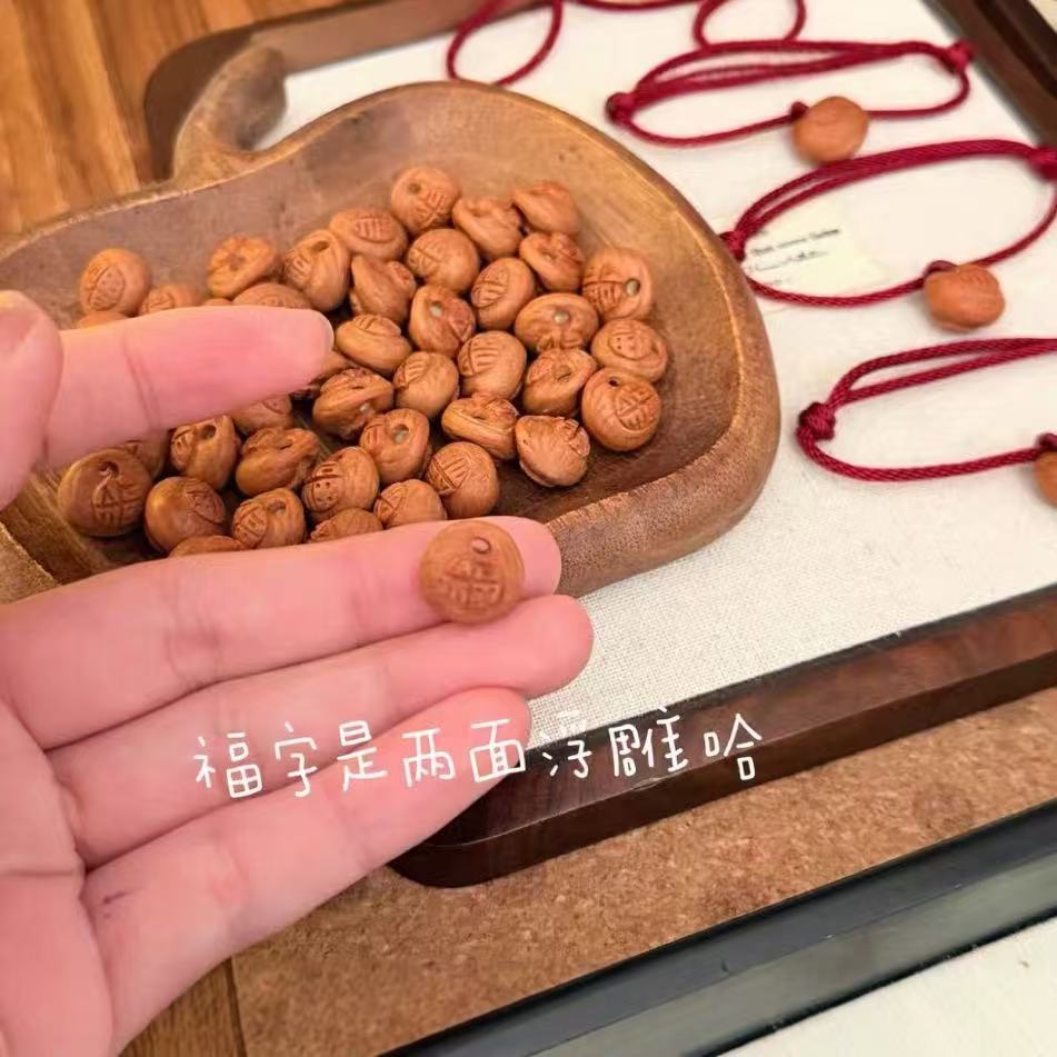 桃木桃核红绳手链小鱼成