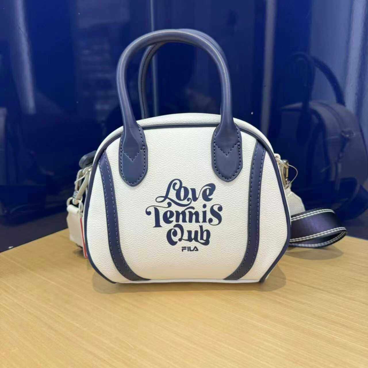 FILA斐乐 2025夏季新款女士时尚运动包休闲挎包+附袋 F13W429162,运动包/户外包/配件,挎包/拎包/休闲包,淘宝优惠券,粉丝福利购,淘宝优惠卷