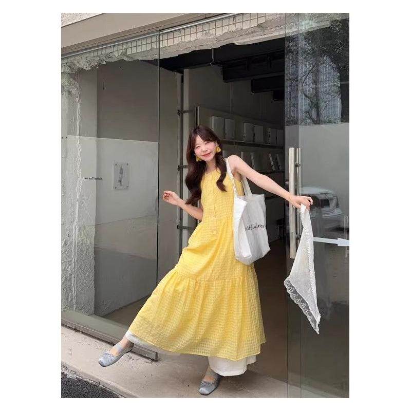 法式无袖背心黄色连衣裙子女夏季2026新款初夏穿搭海边度假风长裙