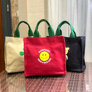 新款帆布内置水杯位大容量帆布学生饭盒袋便当包上班通勤妈咪包