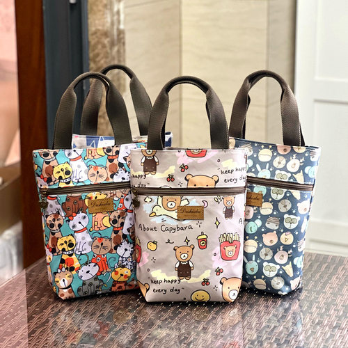 新款加大防水手提卡通水杯袋焖烧杯雨伞包零钱钥匙手机手拎袋女包