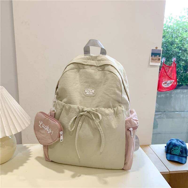 2025新款韩版水洗布女双肩包百搭休闲中学生校园轻 便拼色女书包
