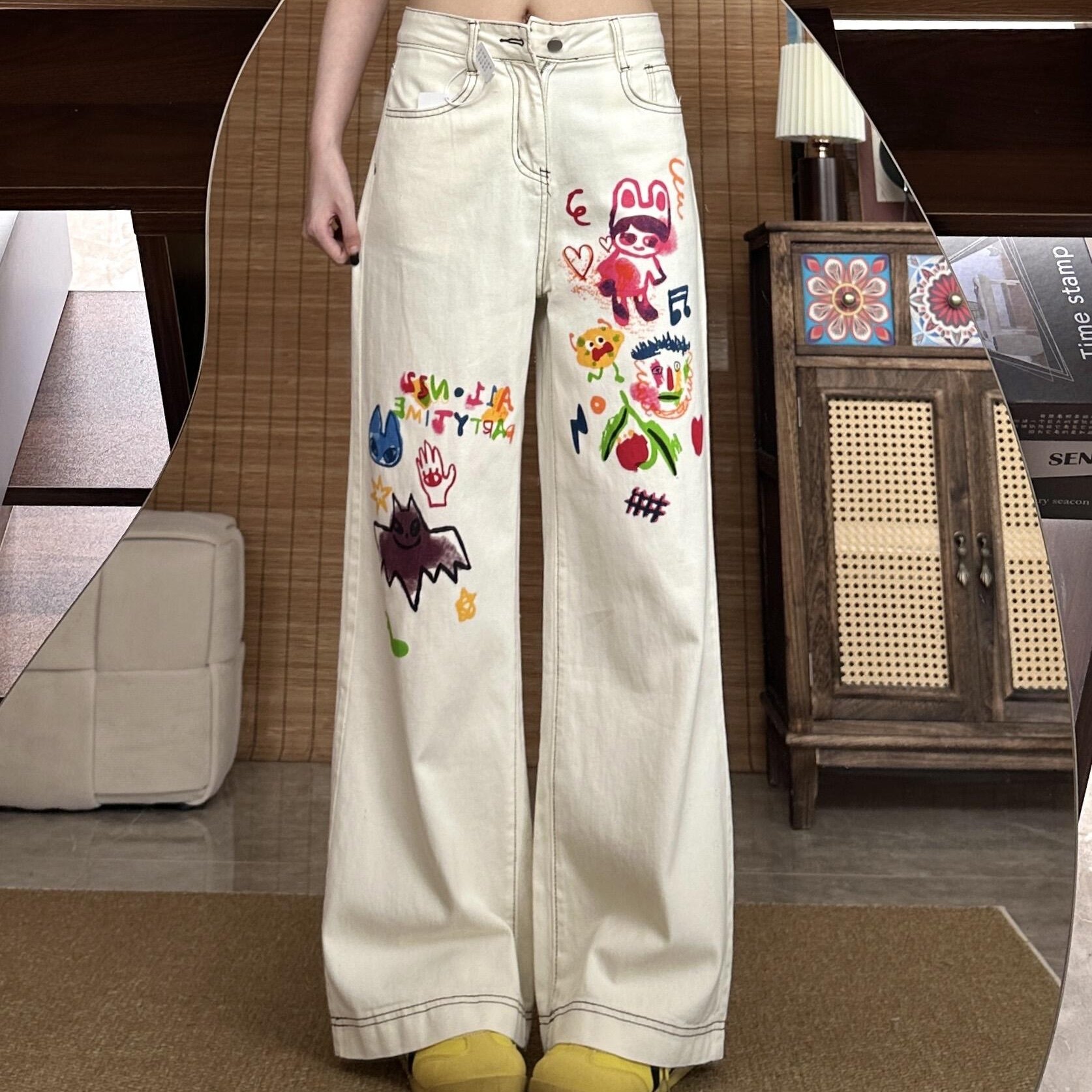 多巴胺卡通手绘印花水洗牛仔裤2026春季新款美式复古宽松直筒长裤