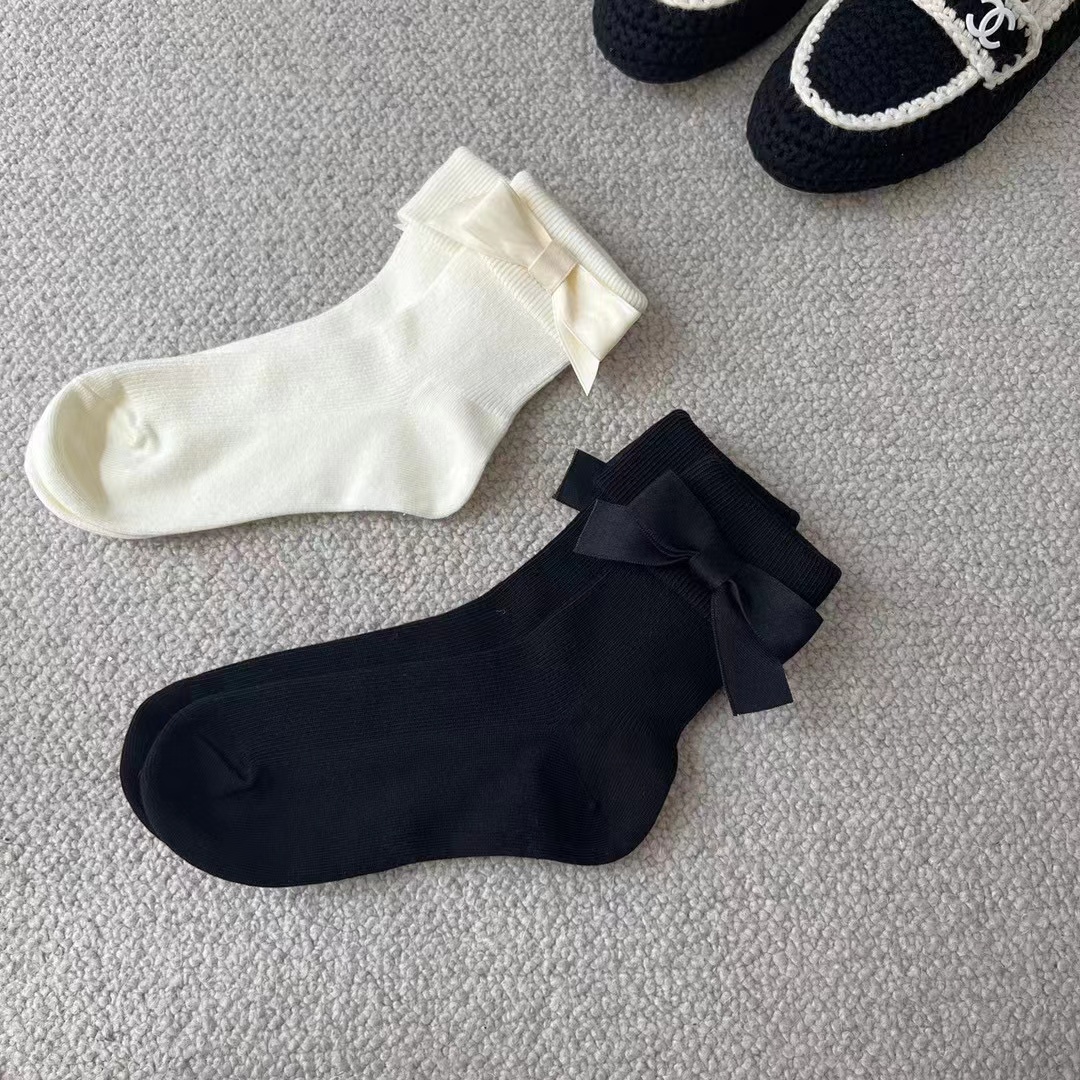 深圳南油欧货诗歌兰同款女袜春季新款挽边手缝蝴蝶结甜美风中筒袜