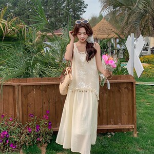休闲吊带连衣裙女夏杏色收腰长裙度假风显瘦搭配特别法式档次通勤