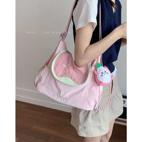 韩系户外通勤帆布包包女2025新款夏季单肩包大容量休闲双肩托特包