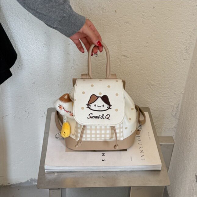 日系软萌格纹翻盖双肩包女小众设计猫咪刺绣包包可爱波点学生书包