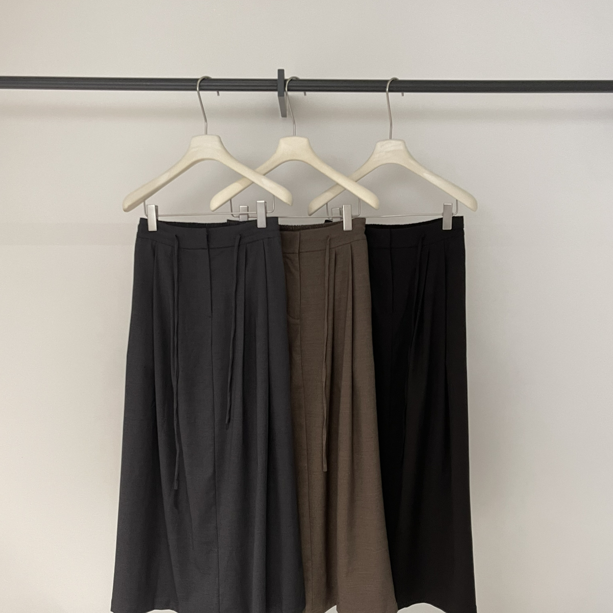 BU RIVERS-秋上新通勤百搭遮胯显瘦西装半身裙S32276