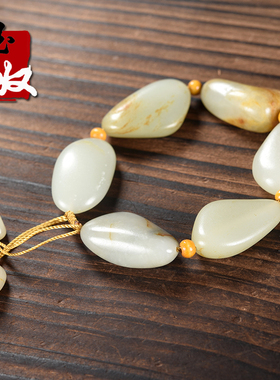 新疆玉龙河天然原皮原色原孔无修洒金皮籽料原石和田玉手串98.3克