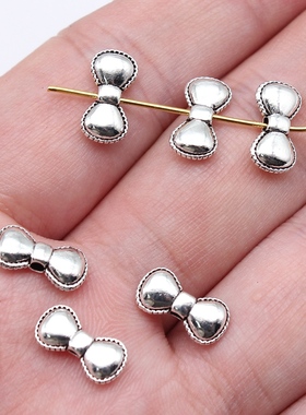40个/包 12x6mm 古银色锌合金材质 蝴蝶结小孔珠 ABD-C16532