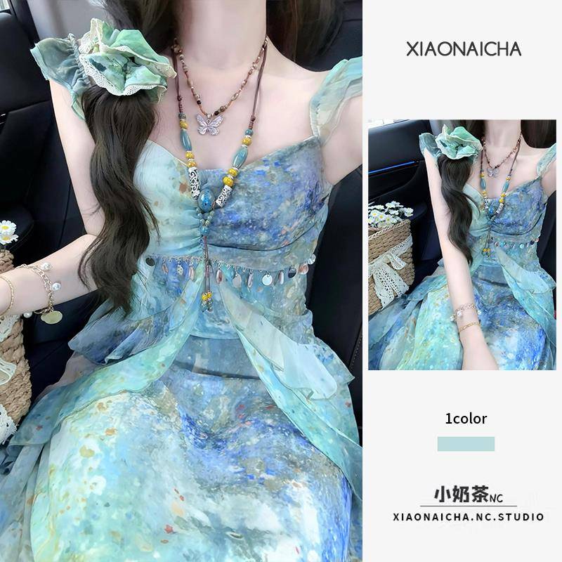 海边度假风印花小飞袖吊带连衣裙女2025夏季新款收腰仙女长裙子