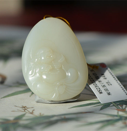 和田玉且末米达料（笑佛）25克