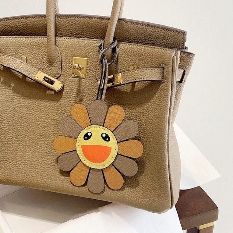 2025新款手工真皮牛皮太阳花包