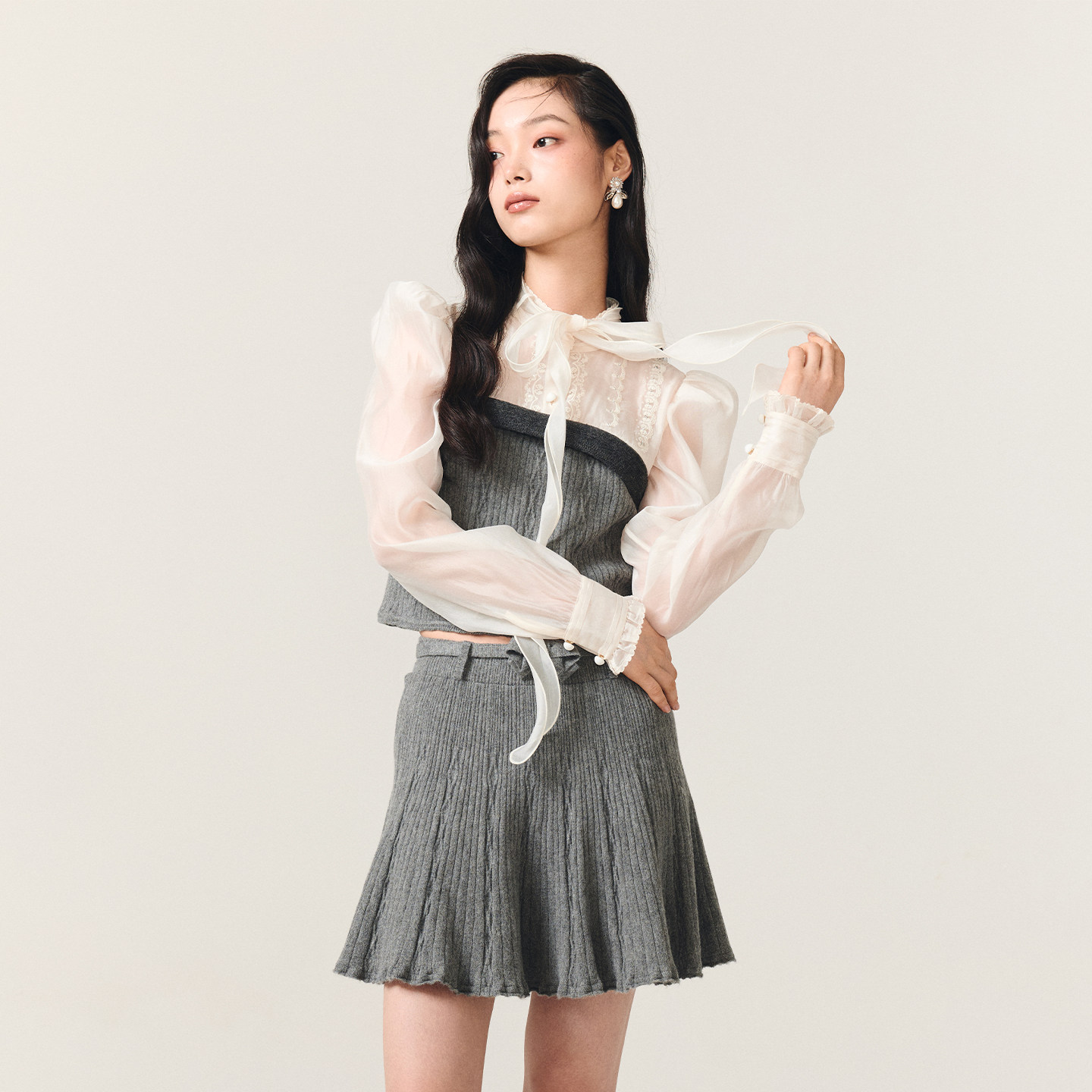 lefame拉飞姆2025冬季新款抹胸式假两件蝴蝶结飘带拼接针织上衣女