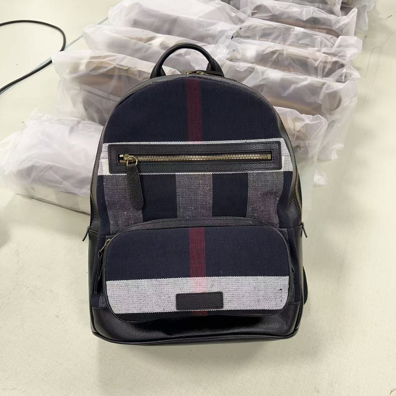 经典半定型兰麻双肩包 男女通用款配牛皮双肩包