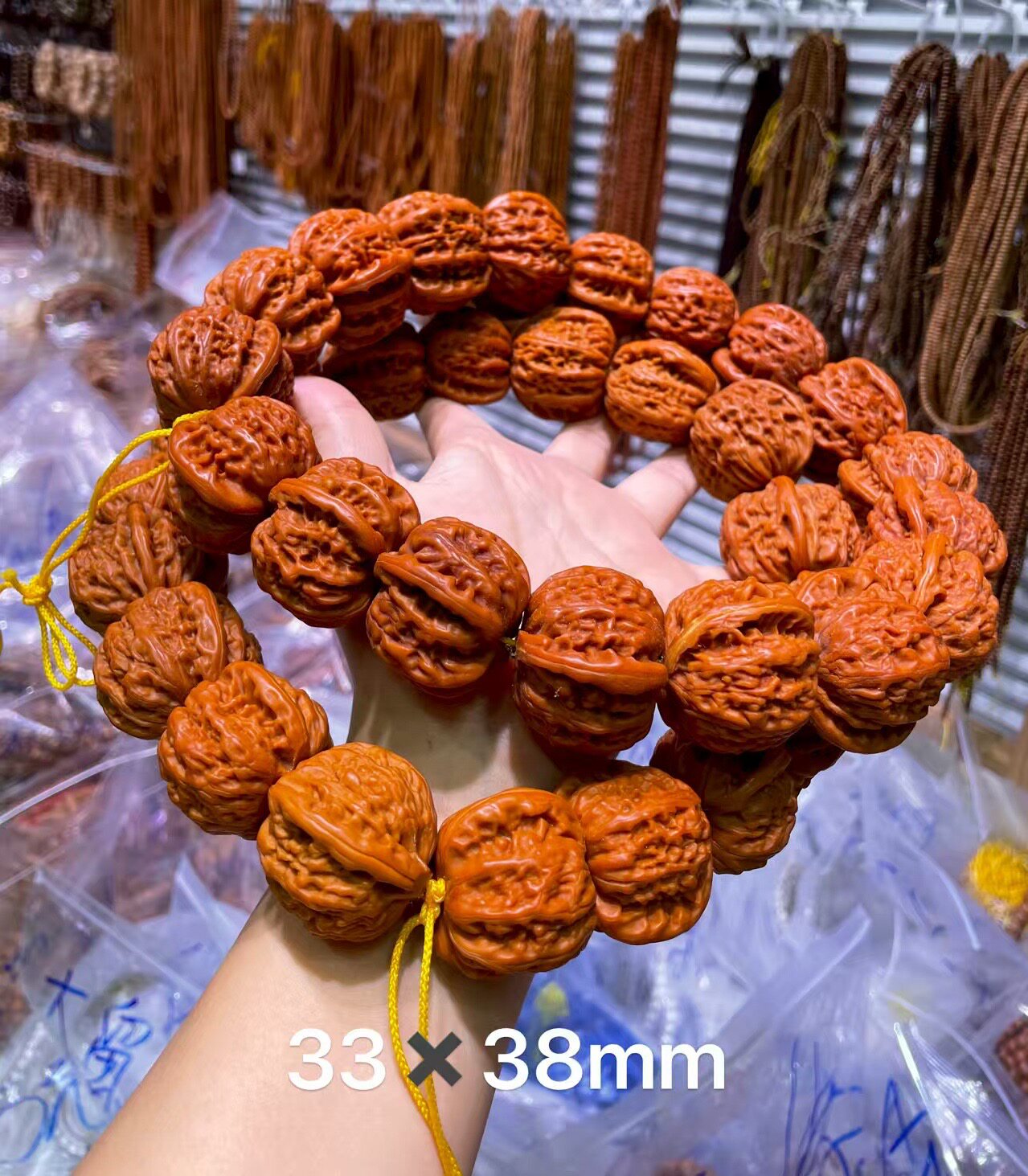 百狮纹小核桃手持33×38mm菩提