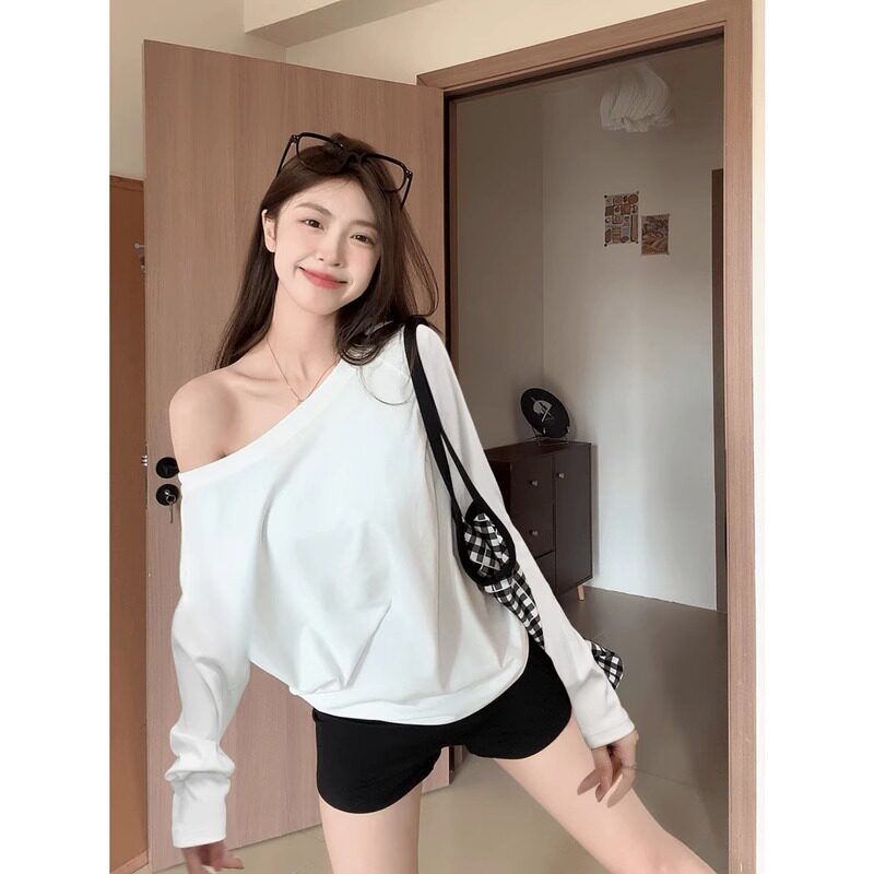 白色斜角肩露肩长袖t恤女