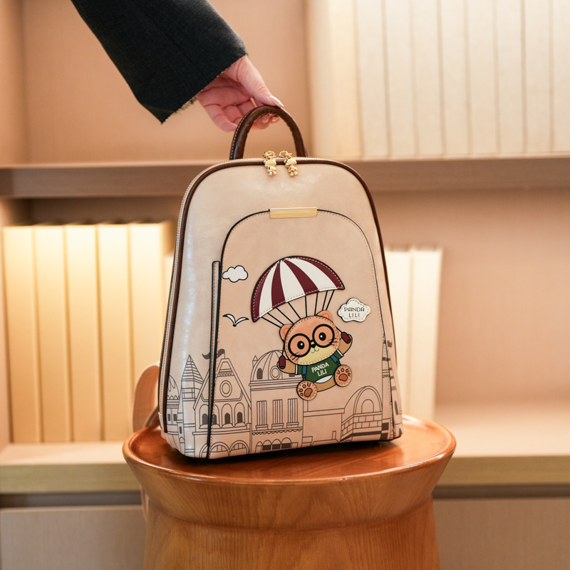 北包包2025新款韩版时尚百搭双肩包女大容量通勤卡通小熊旅行书包