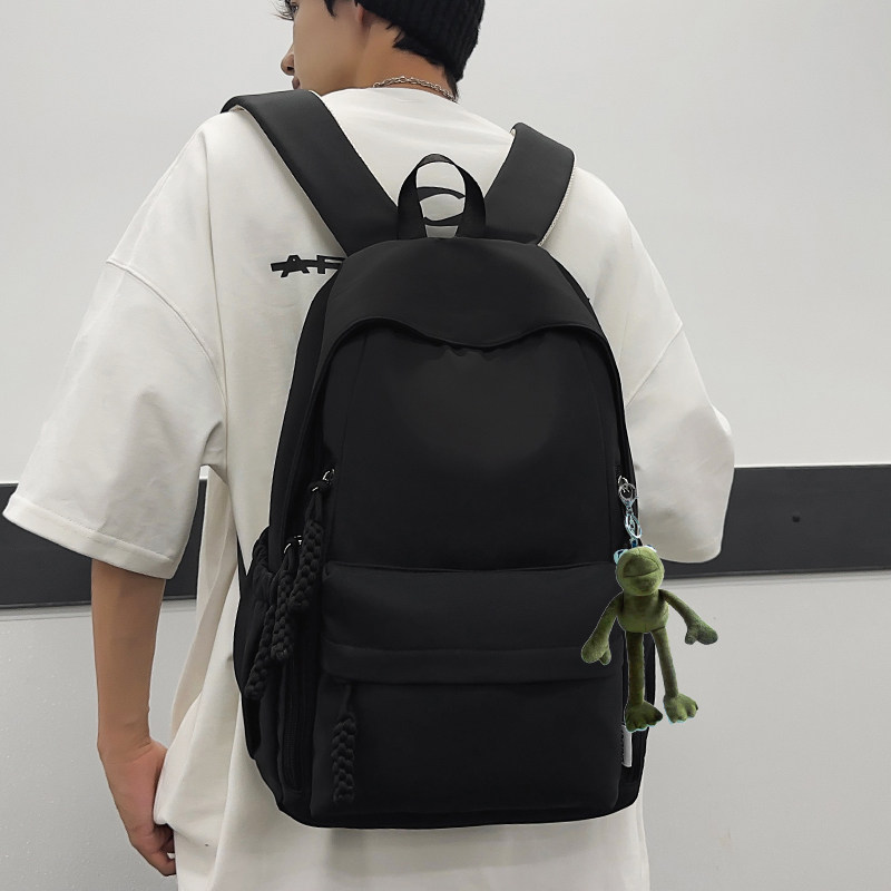 青年双肩包男大学生简约纯色