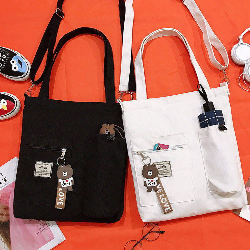 学生帆布包慵懒风韩版初高中大容量手提书袋简约百搭斜挎单肩包