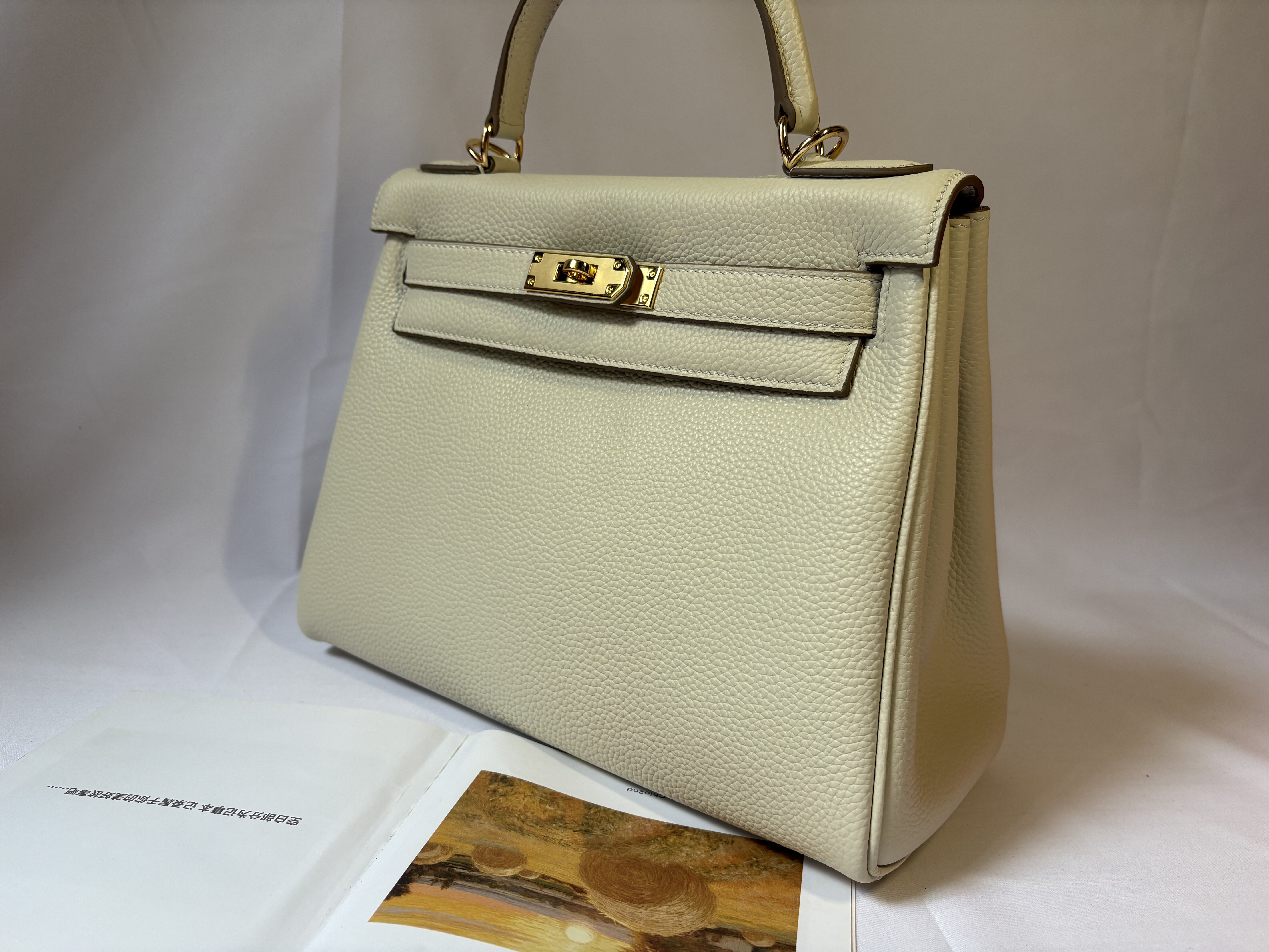 25CM金扣凯莉包荔枝纹皮料内缝手提女包