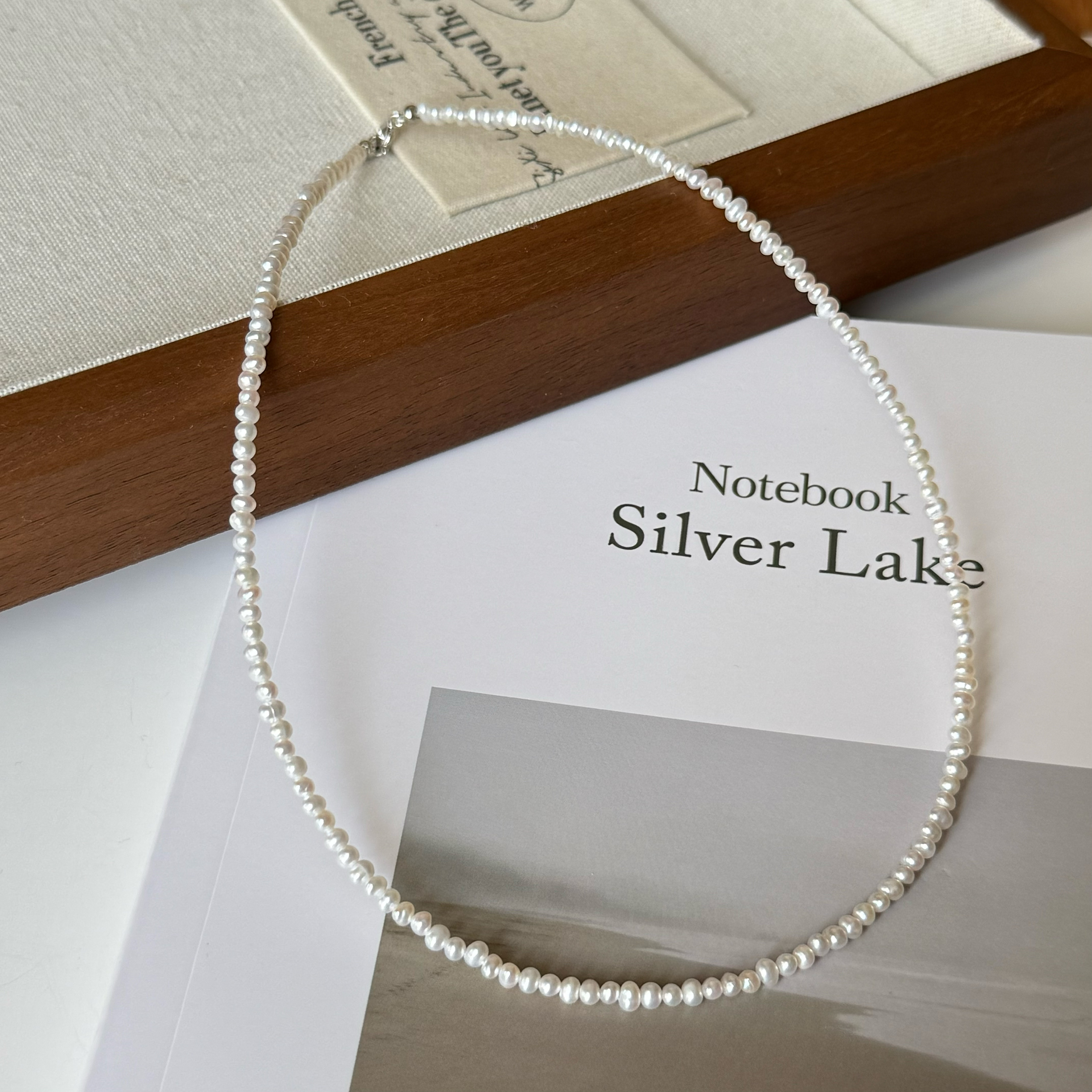 天然淡水珍珠项链s925纯银细锁骨链气质百搭通勤叠戴小众设计感女