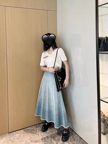 半身裙遮跨拼接A字大摆毛边伞裙