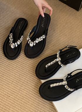 KE LI QI 韩版水钻T字带夹脚凉鞋女2026年新款黑色外穿平底罗马鞋