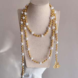 花朵珍珠项链2025新款爆款南洋金珠澳白轻奢小众高级感毛衣链长款
