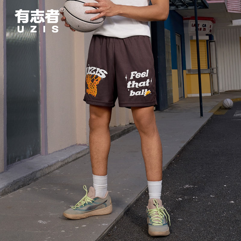 有志者UZIS运动短裤男过网