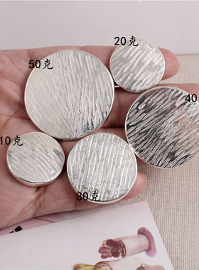 实心圆币足银裹蛋树花纹银币