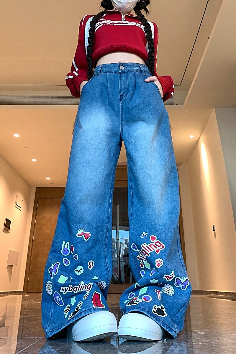 2025新款四季卡通涂鸦印花牛仔裤女高街辣妹阔腿坠感拖地长裤,女装牛仔裤,电商A306A
