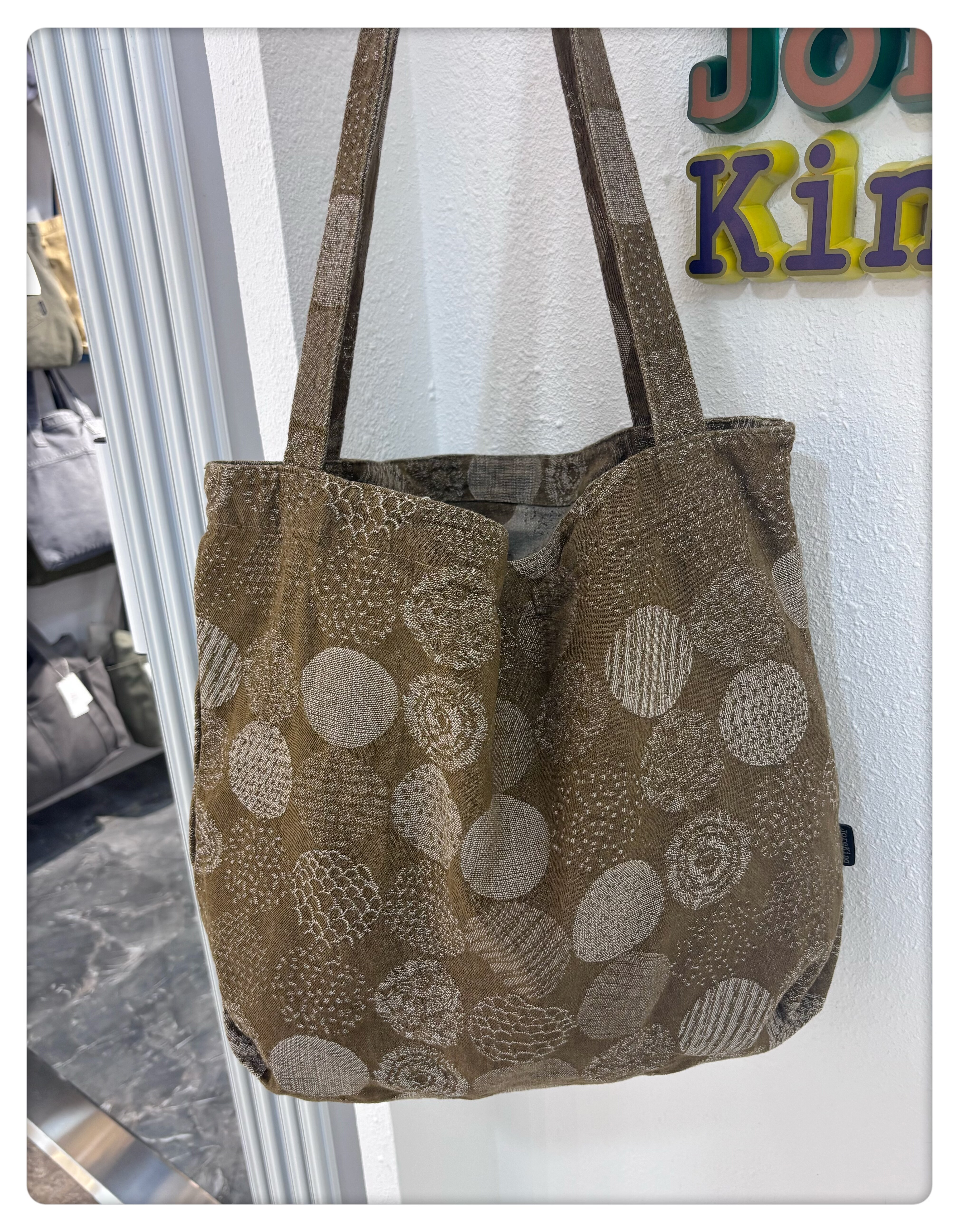 帆布包包女2025新款小众提花手提包通勤复古大容量单肩托特包大包