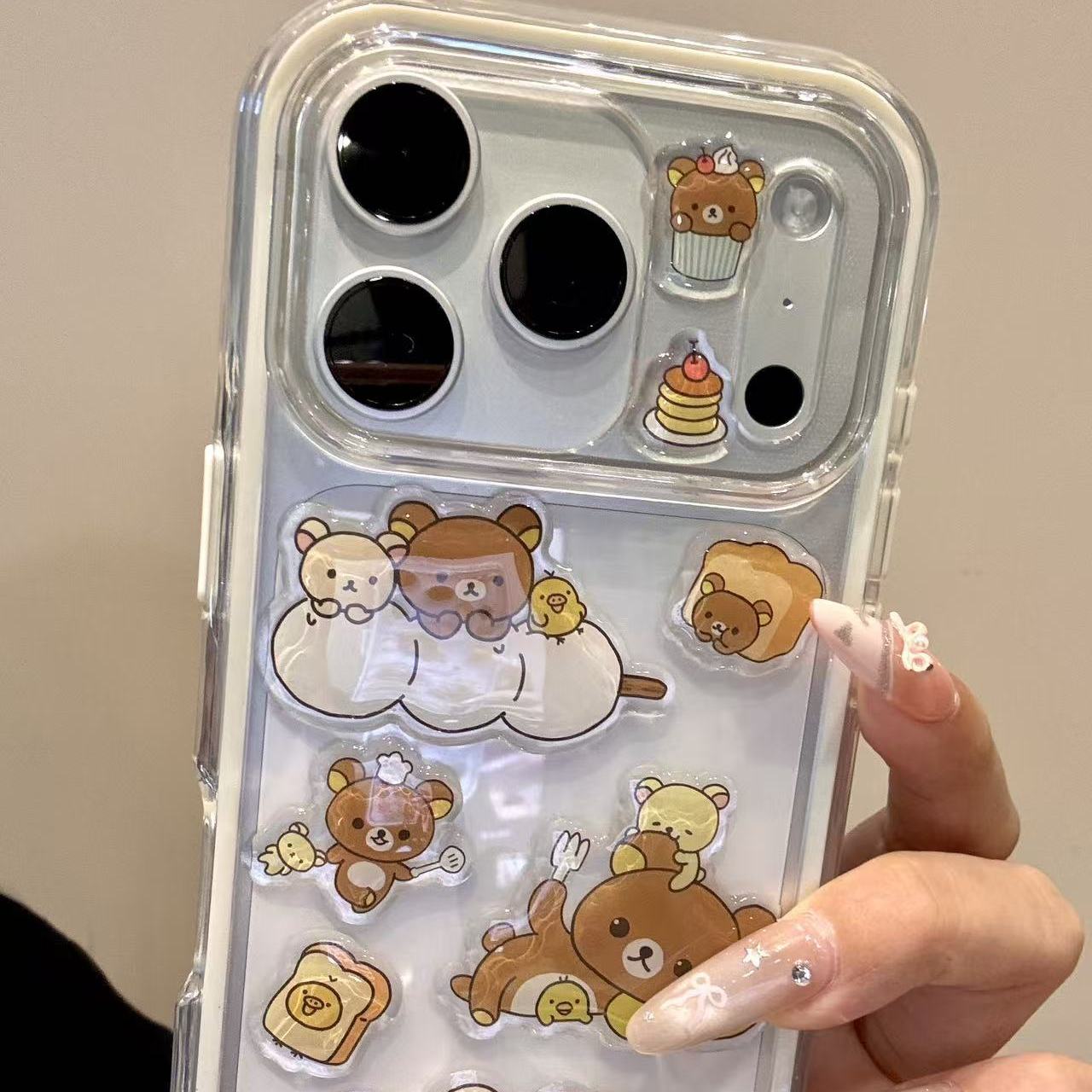 卡通可爱面包蛋糕牵手轻松熊适用ihone17promax苹果16pro手机壳15