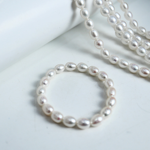 大点位珍珠手链7mm极光无核天然淡水米形珍珠手串女款弹力绳diy