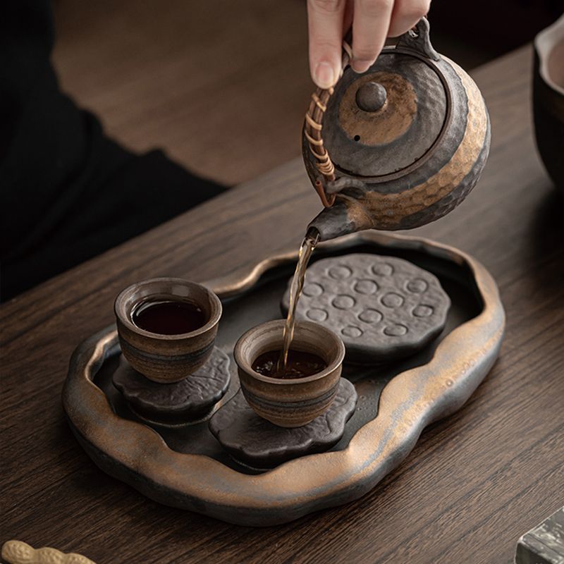 年轻人迷你陶瓷办公茶盘图片