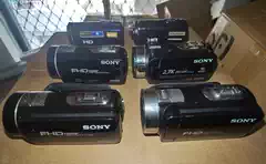 Scraps of Cameras, Second-Hand Dv Camcorders, Video Recorders, Digital Cards That Are Broken or Damaged, Used as Collateral for Debt Settlement