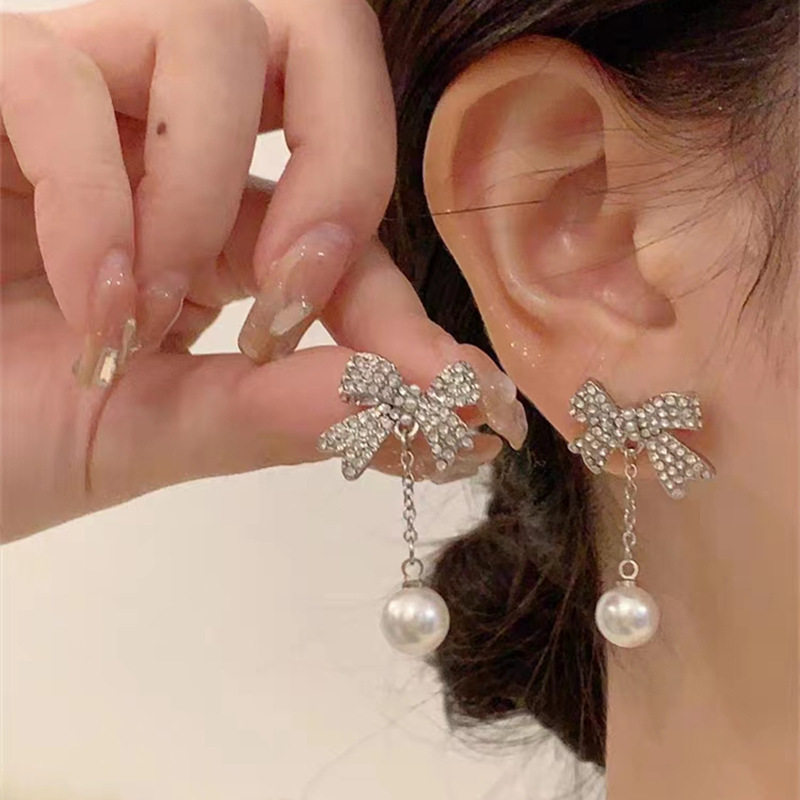 撤柜法式时尚蝴蝶结小众设计耳钉女新款珍珠时尚耳环潮流饰品