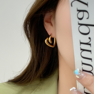 欧美小众高级设计感扭曲镂空金属爱心耳环冷淡风博主网红银针耳环