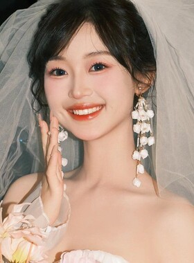 超仙白色铃兰花流苏耳环女夸张结婚纱摄影设计感耳环甜美新娘耳饰