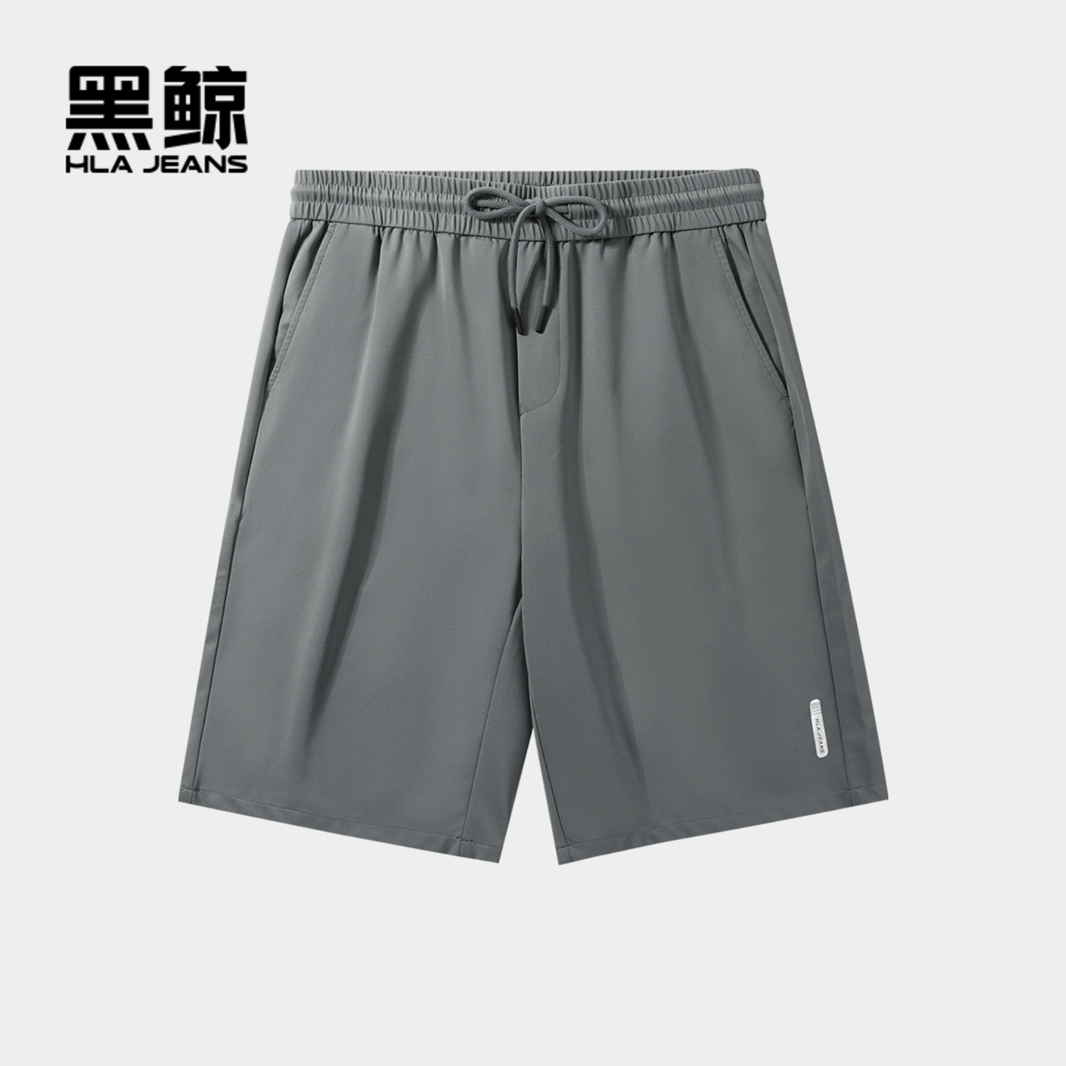 腰间抽绳 宽松版型 斜插口袋