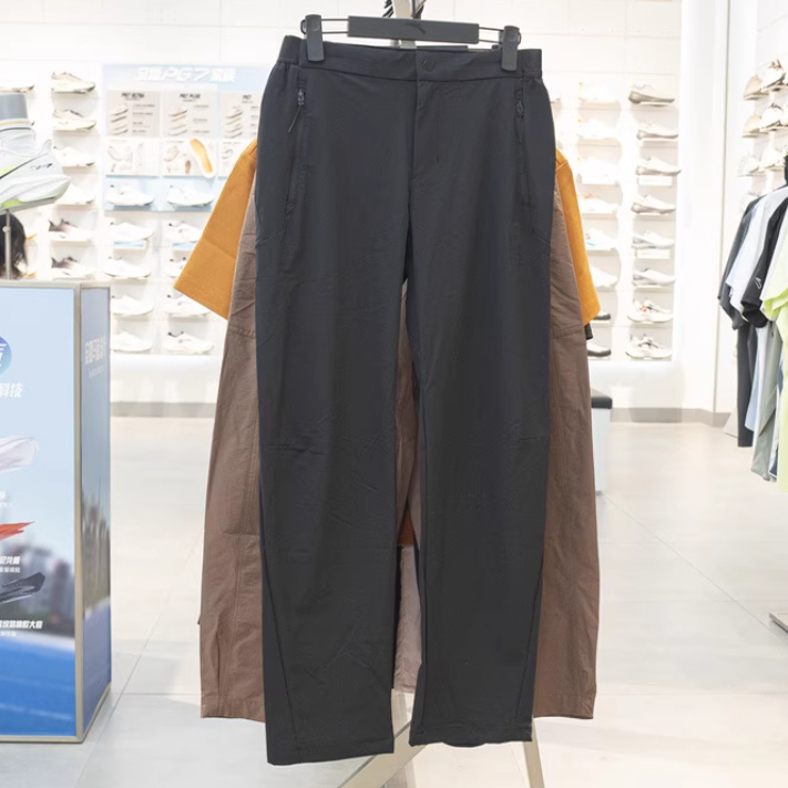 安踏正品女裤2025秋新款国家地理潮流梭织直筒运动长裤162536506