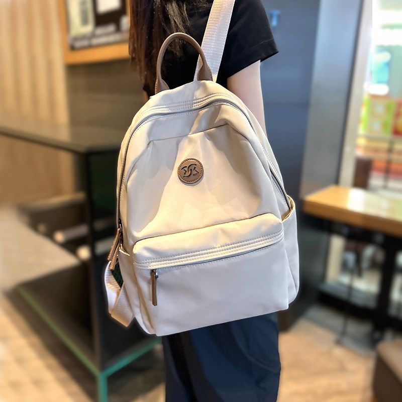 大容量休闲旅游双肩包女2024秋冬新款轻便防水百搭背包电脑学生包,箱包皮具/热销女包/男包,双肩背包,淘宝优惠券,粉丝福利购,淘宝优惠卷