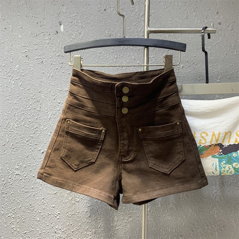 早秋2024新款超高腰单排扣咖啡色牛仔短裤女时髦显瘦辣妹a字热裤