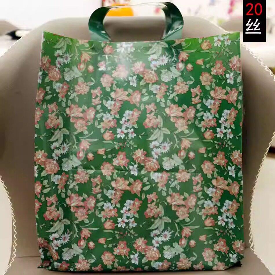 服装店手提袋羽绒棉服塑料袋竖款特厚时尚礼品袋购物袋网红礼品袋图片