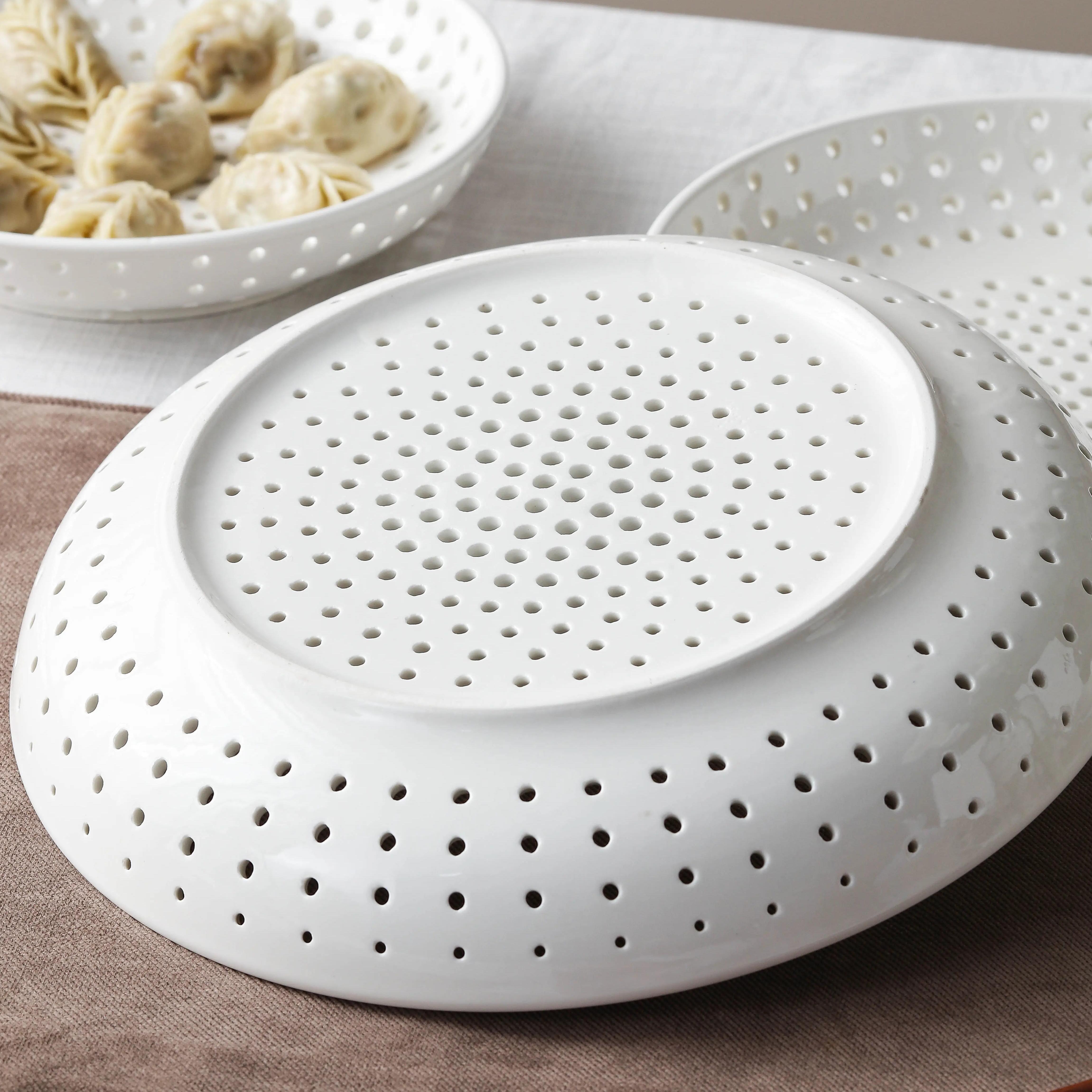 陶瓷多孔蒸盘水饺盘创意家用圆形蒸碟蒸海鲜沥水盘水果盘微波炉