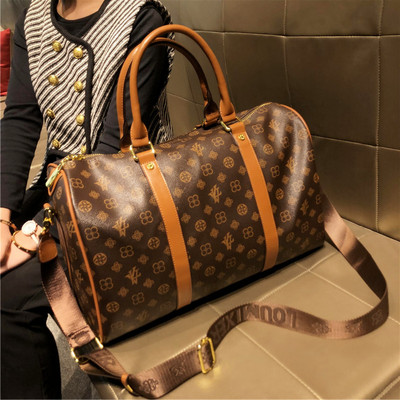 香港品牌大容量真皮质感旅行袋